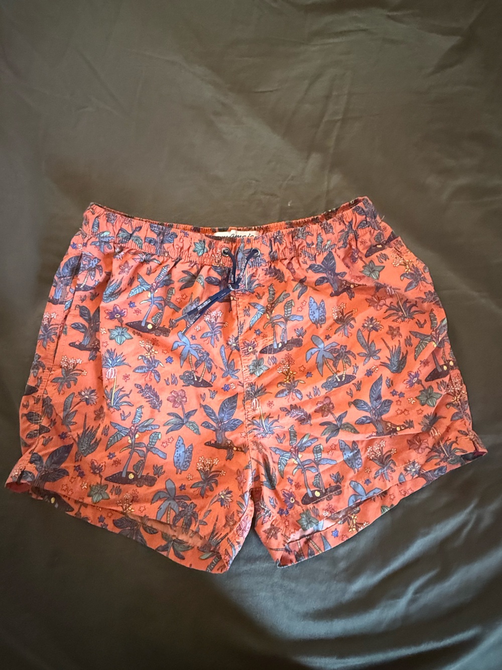 Men's Coral Swim Trunks with Blue Tropical Print